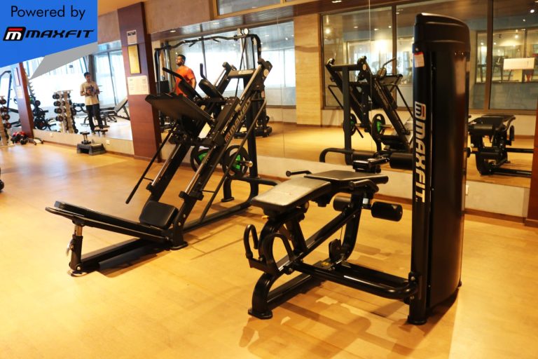 Ananda Bay Hills clubhouse featuring Maxfit commercial gym equipment, indoor games and outdoor play area by Maxfit Equipment Solutions in Narsingi, Hyderabad.