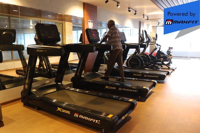 Ananda Bay Hills clubhouse featuring Maxfit commercial gym equipment, indoor games and outdoor play area by Maxfit Equipment Solutions in Narsingi, Hyderabad.