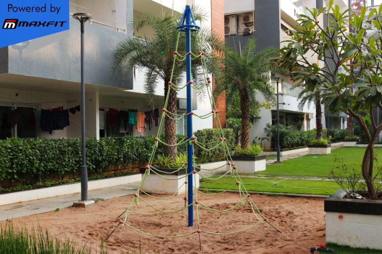 Ananda Bay Hills clubhouse featuring Maxfit commercial gym equipment, indoor games and outdoor play area by Maxfit Equipment Solutions in Narsingi, Hyderabad.