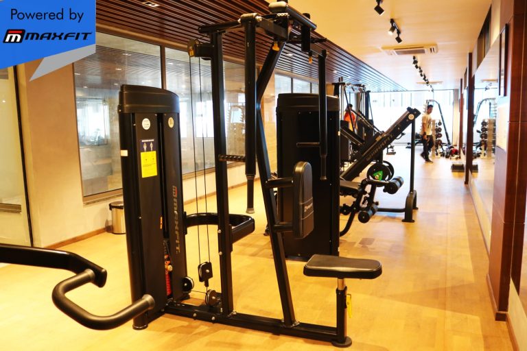 Ananda Bay Hills clubhouse featuring Maxfit commercial gym equipment, indoor games and outdoor play area by Maxfit Equipment Solutions in Narsingi, Hyderabad.
