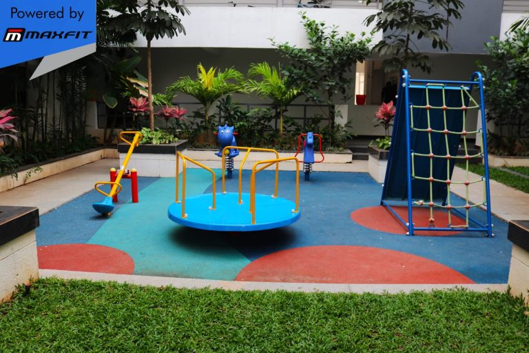 Ananda Bay Hills clubhouse featuring Maxfit commercial gym equipment, indoor games and outdoor play area by Maxfit Equipment Solutions in Narsingi, Hyderabad.