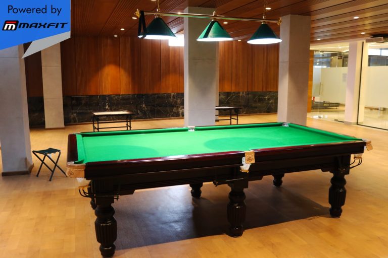 Ananda Bay Hills clubhouse featuring Maxfit commercial gym equipment, indoor games and outdoor play area by Maxfit Equipment Solutions in Narsingi, Hyderabad.