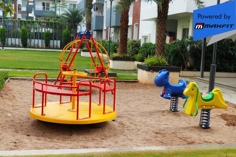 Ananda Bay Hills clubhouse featuring Maxfit commercial gym equipment, indoor games and outdoor play area by Maxfit Equipment Solutions in Narsingi, Hyderabad.