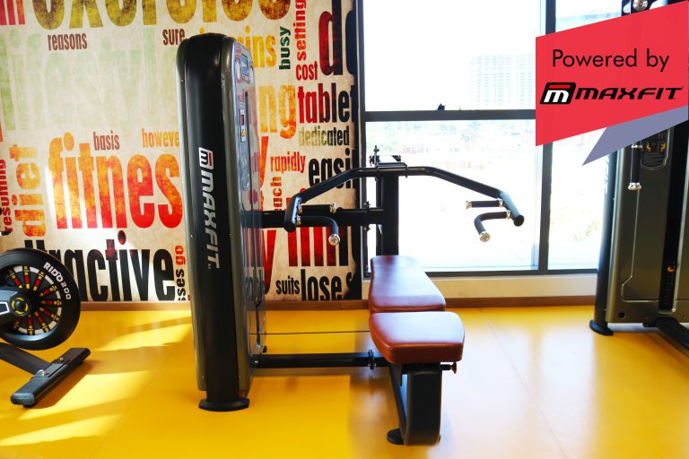 Sumadhura Acropolis premium clubhouse gym in Nanakramguda, Hyderabad, featuring Maxfit commercial fitness equipment by Maxfit Equipment Solutions.