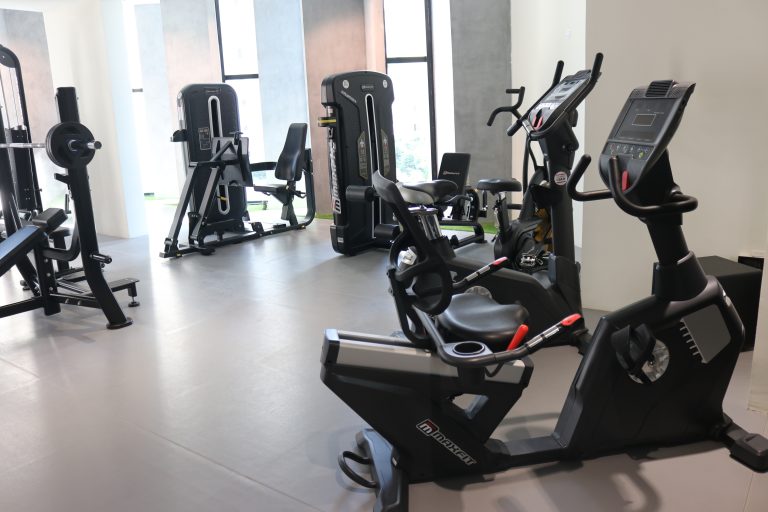 Hallmark Vicinia clubhouse gym in Narsingi, Hyderabad, featuring Maxfit commercial fitness equipment by Maxfit Equipment Solutions.