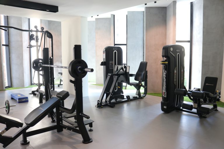 Hallmark Vicinia clubhouse gym in Narsingi, Hyderabad, featuring Maxfit commercial fitness equipment by Maxfit Equipment Solutions.