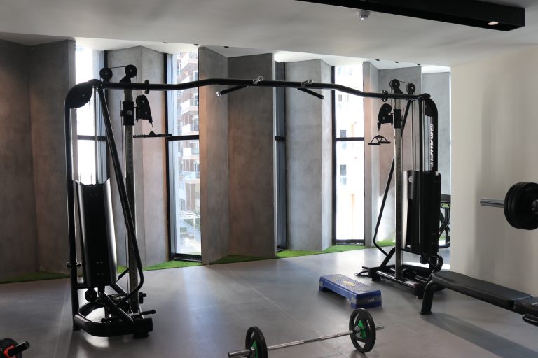 Hallmark Vicinia clubhouse gym in Narsingi, Hyderabad, featuring Maxfit commercial fitness equipment by Maxfit Equipment Solutions.