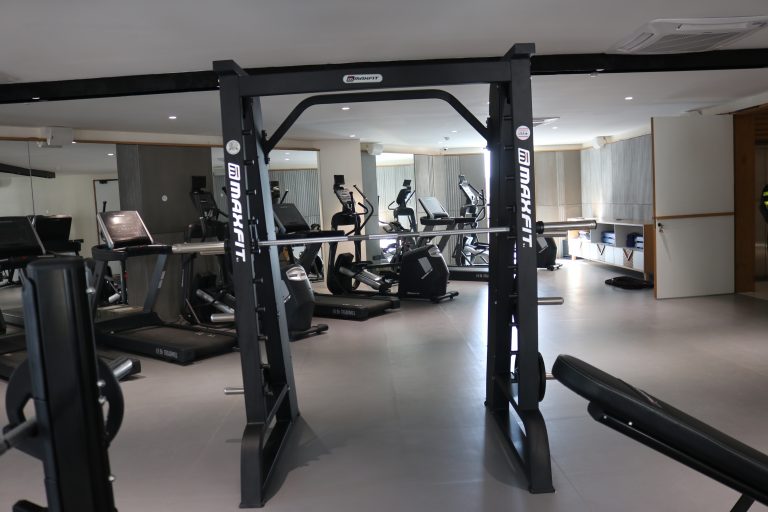 Hallmark Vicinia clubhouse gym in Narsingi, Hyderabad, featuring Maxfit commercial fitness equipment by Maxfit Equipment Solutions.