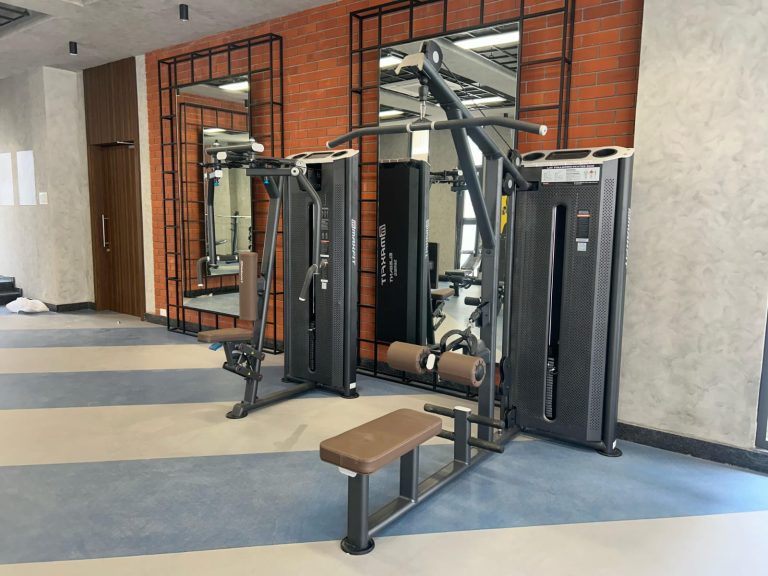 Adani Amogha Ahmedabad strength gym installation with commercial fitness equipment by Maxfit Hyderabad