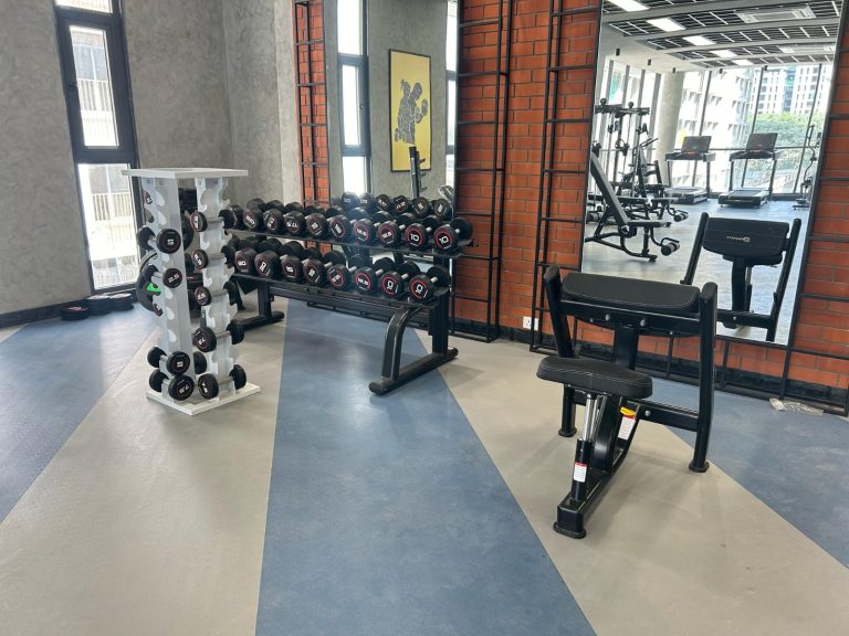 Adani Amogha Ahmedabad strength gym installation with commercial fitness equipment by Maxfit Hyderabad
